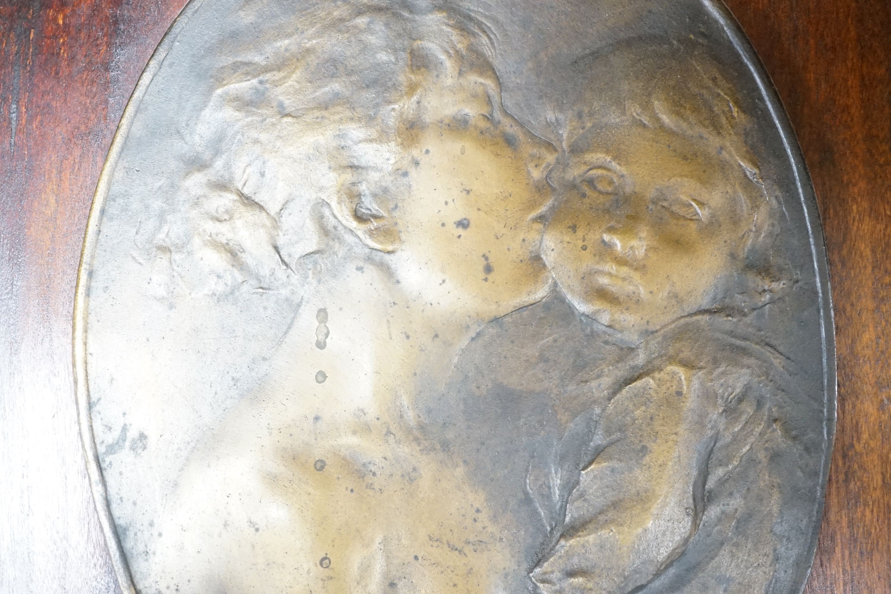 Robert Greter - oval relief plaque of a mother and child, mounted on board, plaque 26x19cm